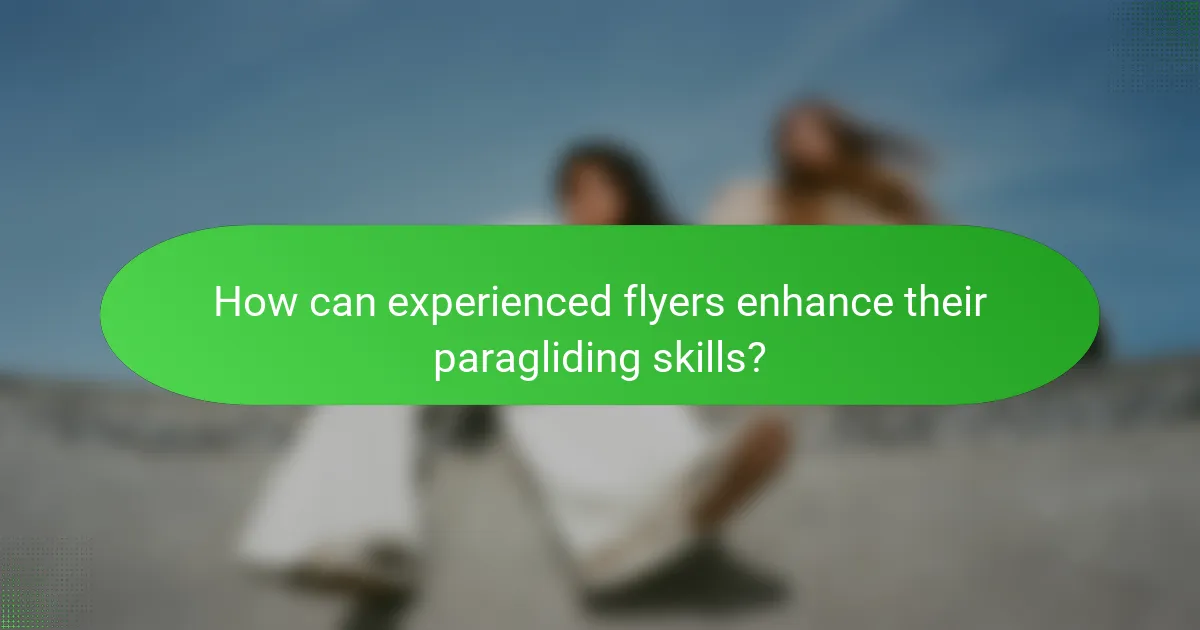 How can experienced flyers enhance their paragliding skills?