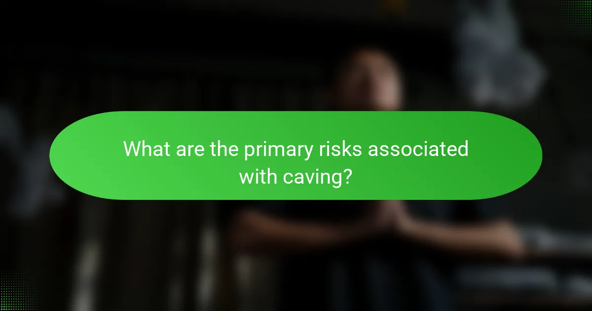 What are the primary risks associated with caving?