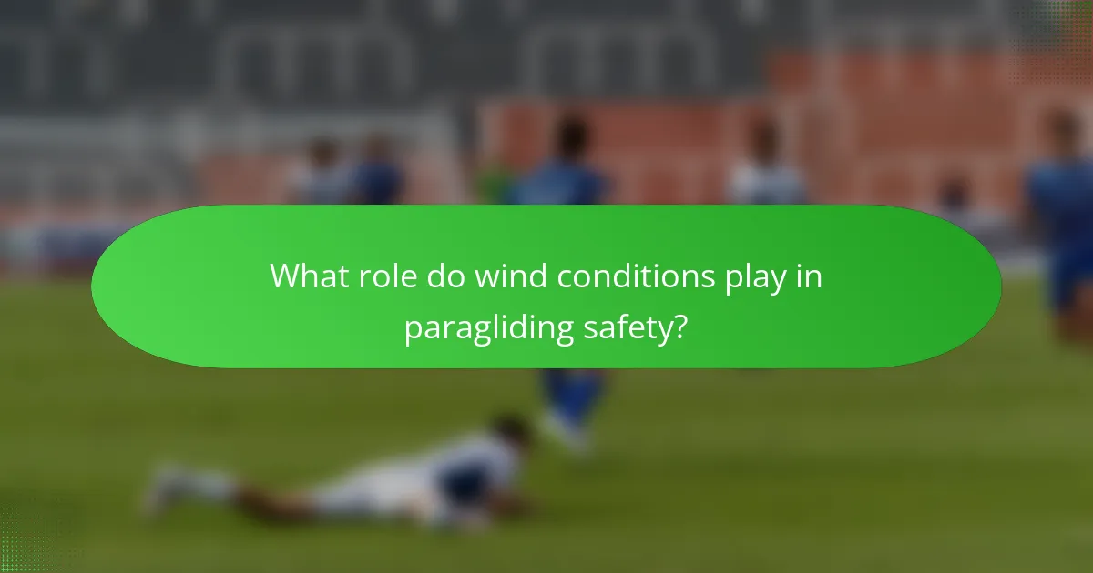 What role do wind conditions play in paragliding safety?
